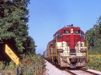 Peter Jobe photographed TH&B 74 and TH&B 73 on the head of a southbound freight in Smithville, Ontario at 2:10 P.M. on Monday September 15, 1980.
