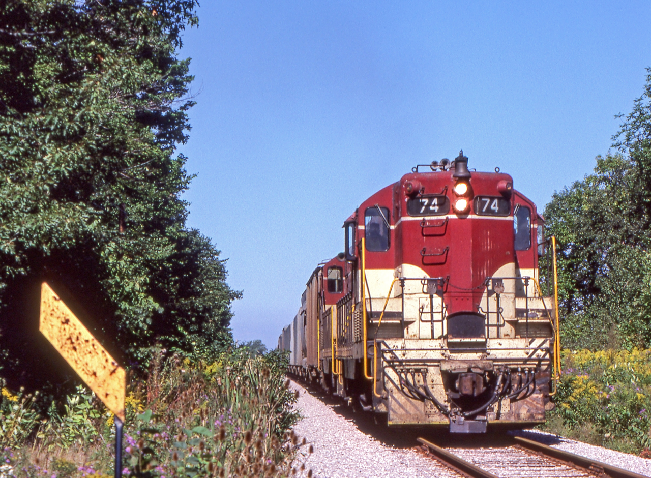 Peter Jobe photographed TH&B 74 and TH&B 73 on the head of a southbound freight in Smithville, Ontario at 2:10 P.M. on Monday September 15, 1980.
