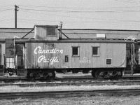 <br>
<br>
 wooden caboose CP 437053 at John Street coupled between two modern ( for that time ) multimark CP Rail run through cabooses
<br>
<br>
 CP 437053 would survive into 1987, listed in the November issue Branchline along with 41 other wooden cabooses as sold, dismantled or slated for retirement ( and 10 run through steel cabooses with same fate)
<br>
<br>
 and at that time never occurred to me that the CP Rail multimark would be one day be history too
 <br>
<br>
 At CP Rail John Street, 1977 Kodak negative by S.Danko
<br>
<br>
