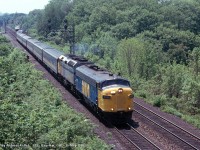 Windsor to Toronto train #72 passes through Bayview Junction with VIA 6569 - VIA 6425 leading 8 blue coaches.

6569 was built as CP 4069 in August of 1952
6425 was delivered new in July of 1987