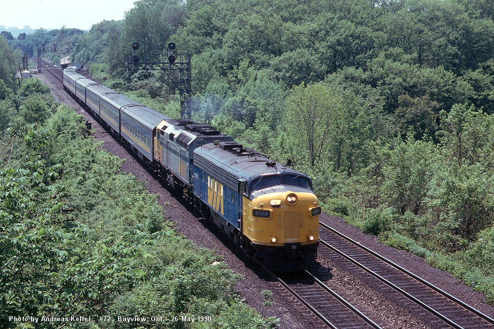 Windsor to Toronto train #72 passes through Bayview Junction with VIA 6569 - VIA 6425 leading 8 blue coaches.

6569 was built as CP 4069 in August of 1952
6425 was delivered new in July of 1987