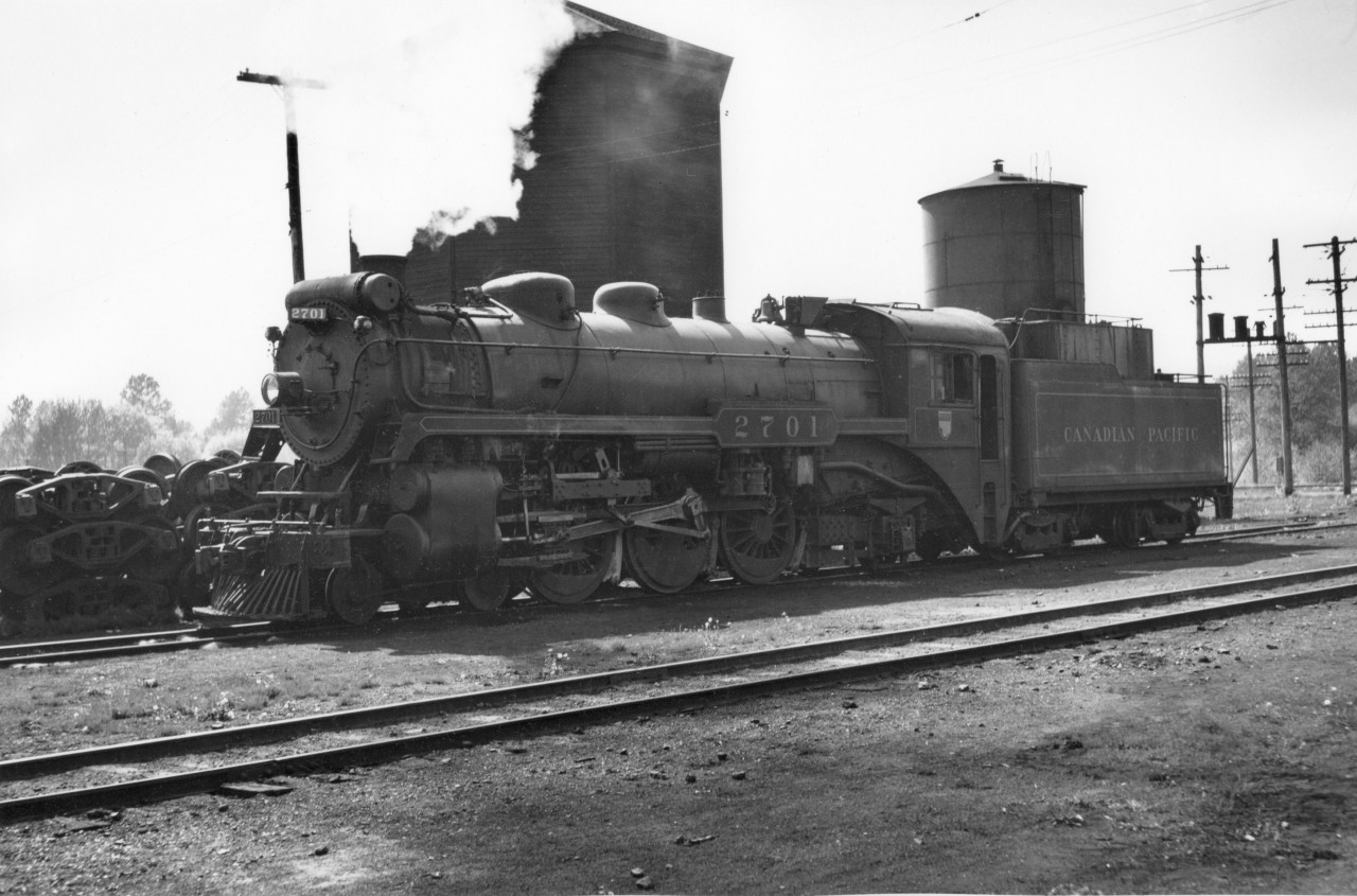 2701 at Coquitlam engine servicing area.  In the background, those 5 foot gauge trucks for Russia appear.