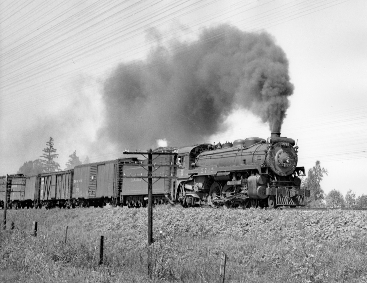 A long Fraser Valley freight with engine 2715 eastbound, 1 mile west of Hammond.