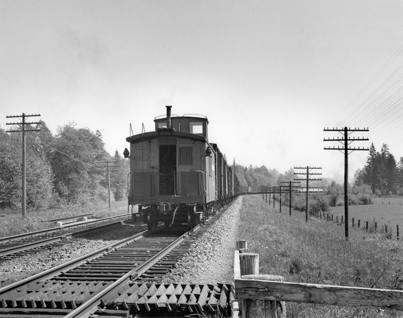 Caboose of 2715 east, 1 mile west of Hammond.