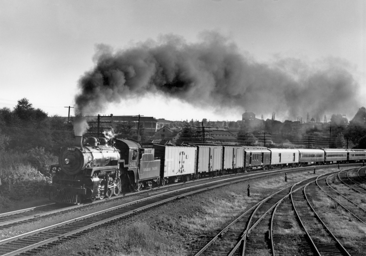 Train no. 12 with engine 3611 in Vancouver.  In the background you can see some of the rides at the PNE.