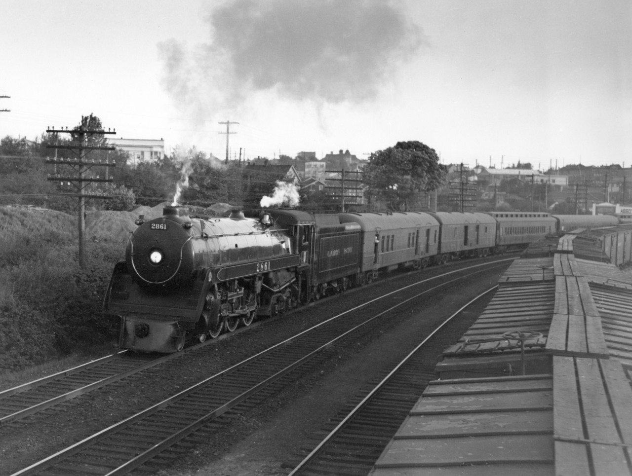 First section of Train no. 8 with engine 2861 in Vancouver.  Green flags on engine indicate there is a another section of train no. 8 following.