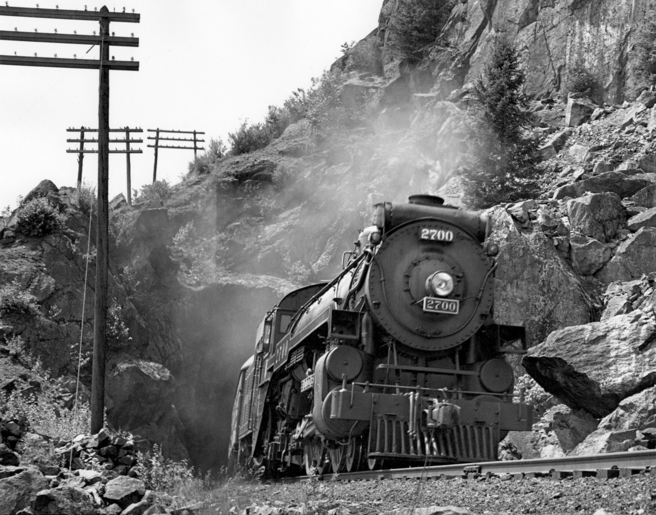 First section of train no. 2 with engine 2700 at Harrison tunnels.  This is between Harrison Mills and Aggasiz.