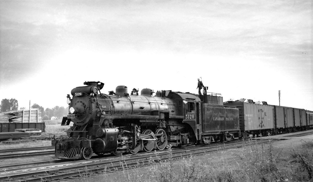 Engine 5120 on train no. 12 at Mission, possibly taking water at standpipe