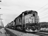 With the air conditioning on full CN 2107 heads west at the tip of Montreal Island.