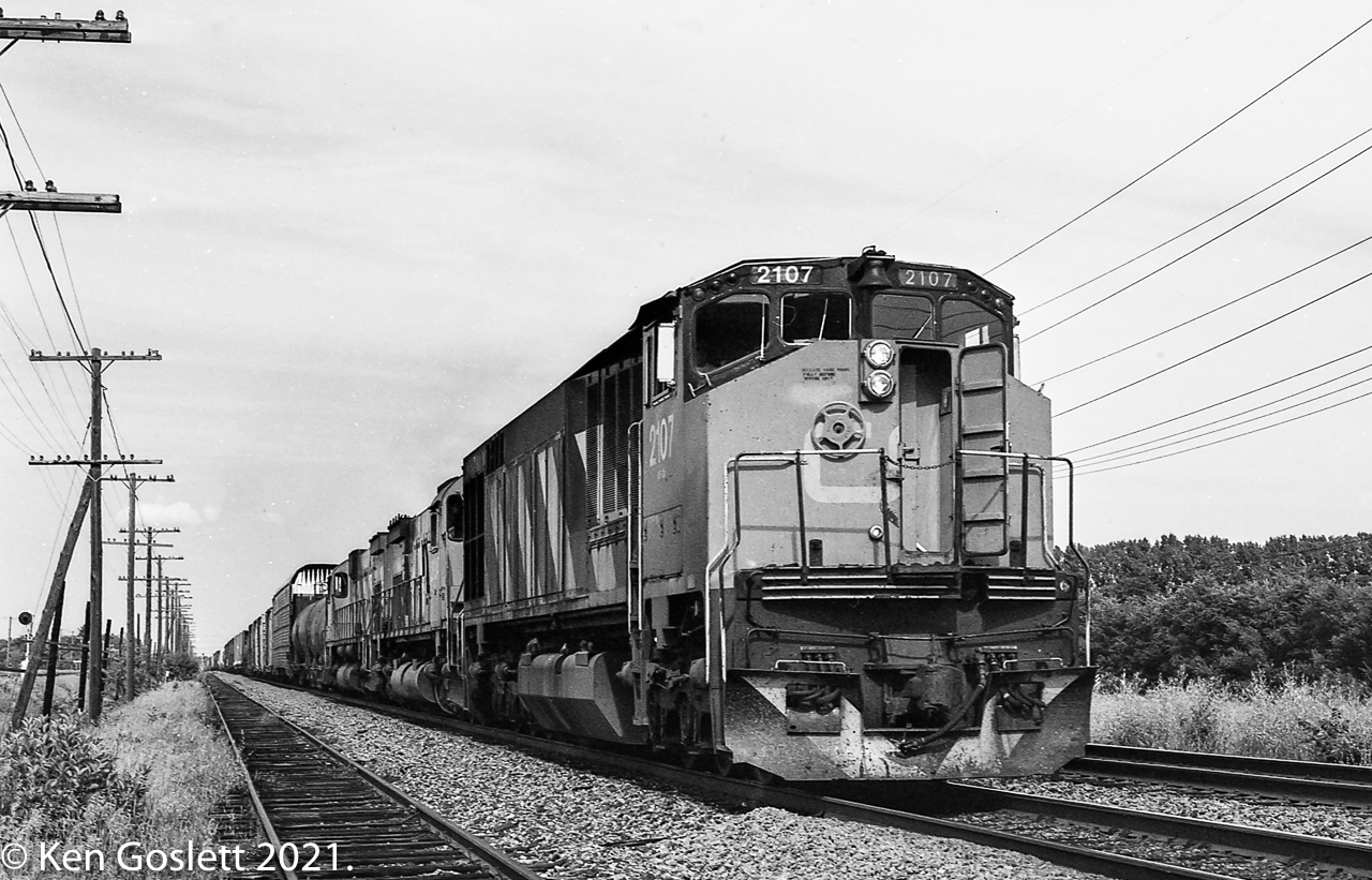 With the air conditioning on full CN 2107 heads west at the tip of Montreal Island.