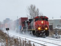 A late Christmas present from CN. I'm wrapping up a mini-chase with CN 107 and GO 625 north of Toronto when I get the word that CN Q101 has CN 2501 (Canadian Safety Cab Dash 9) leading coming out of Brampton. Turn on the scanner and low and behold, CN 101 is asking about CN 105s location on the York and it is passing Mac yard. A couple trains later (Z114 in Gormley and Q105 minutes earlier), CN 101 makes its way north with a gorgeous sounding mechanical bell on the front end of CN 2501. A little bonus was the class lights activated on the C44-9WL. Everyone is talking about the Dash 8s being on borrowed time but I don't think these won't be around for too much longer either. 