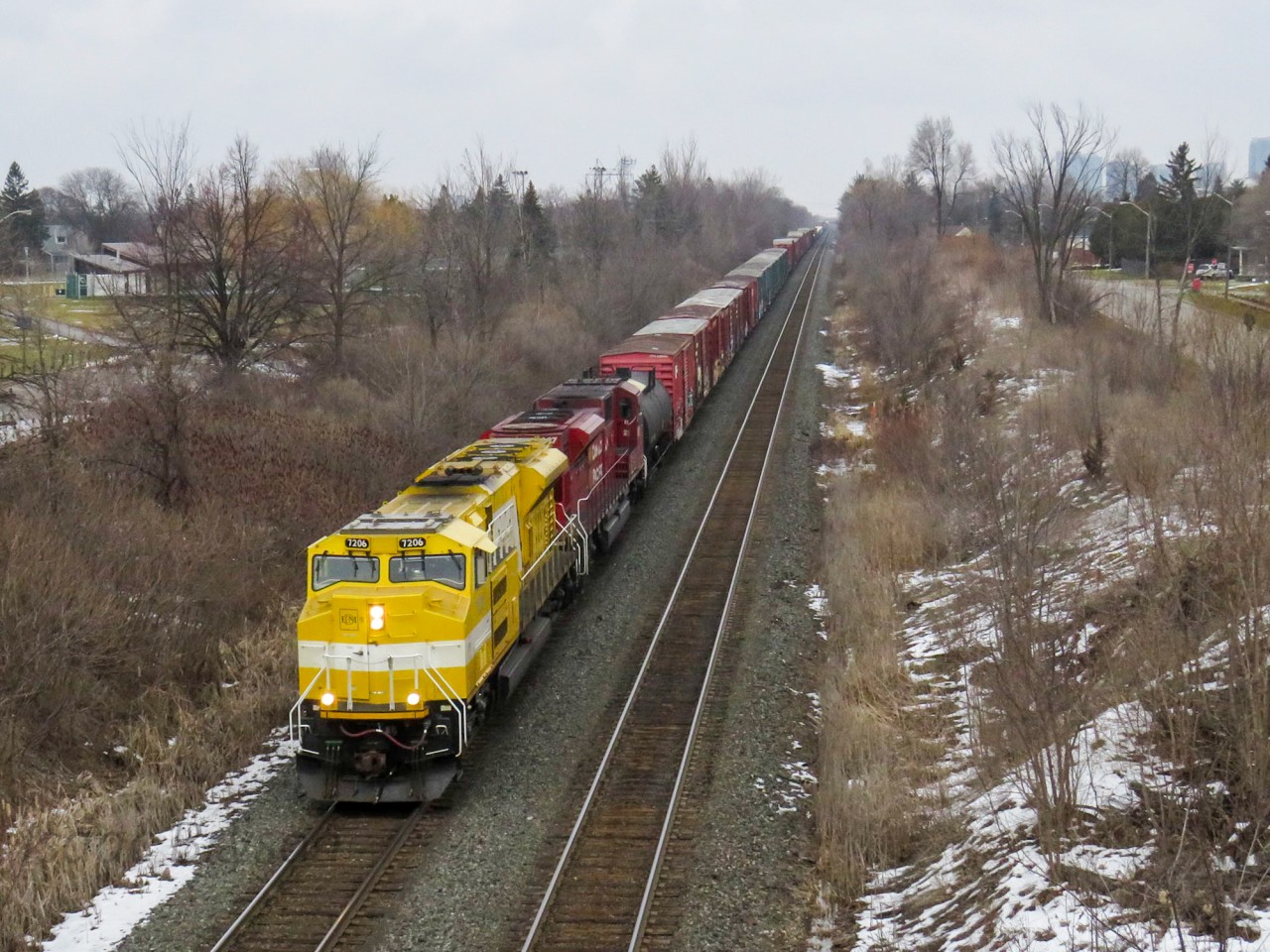 "EMDX Seven two naught six clear signal Kennedy." CP 421 crawls out of Toronto (Agincourt yard) with A full modern EMD consist of EMDX 7206 and CP 7027. After 3 weeks of watching them trail every train into and out of Toronto, it was nice to finally see these things lead. This was the 2nd day in a row (and the 2nd day ever) that an EMDX SD70ACE-T4 led a train out of Toronto. Even though I have made my opinion of these units very clear, I hope that they continue to lead so that those who actually wish to catch these units leading can.