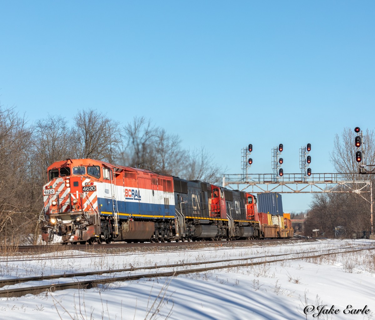 A late CN Z149 passes through Brockville yard, with BCOL 4620 on the point, and two CN SD75i’s trailing as they haul stacks towards Chicago.