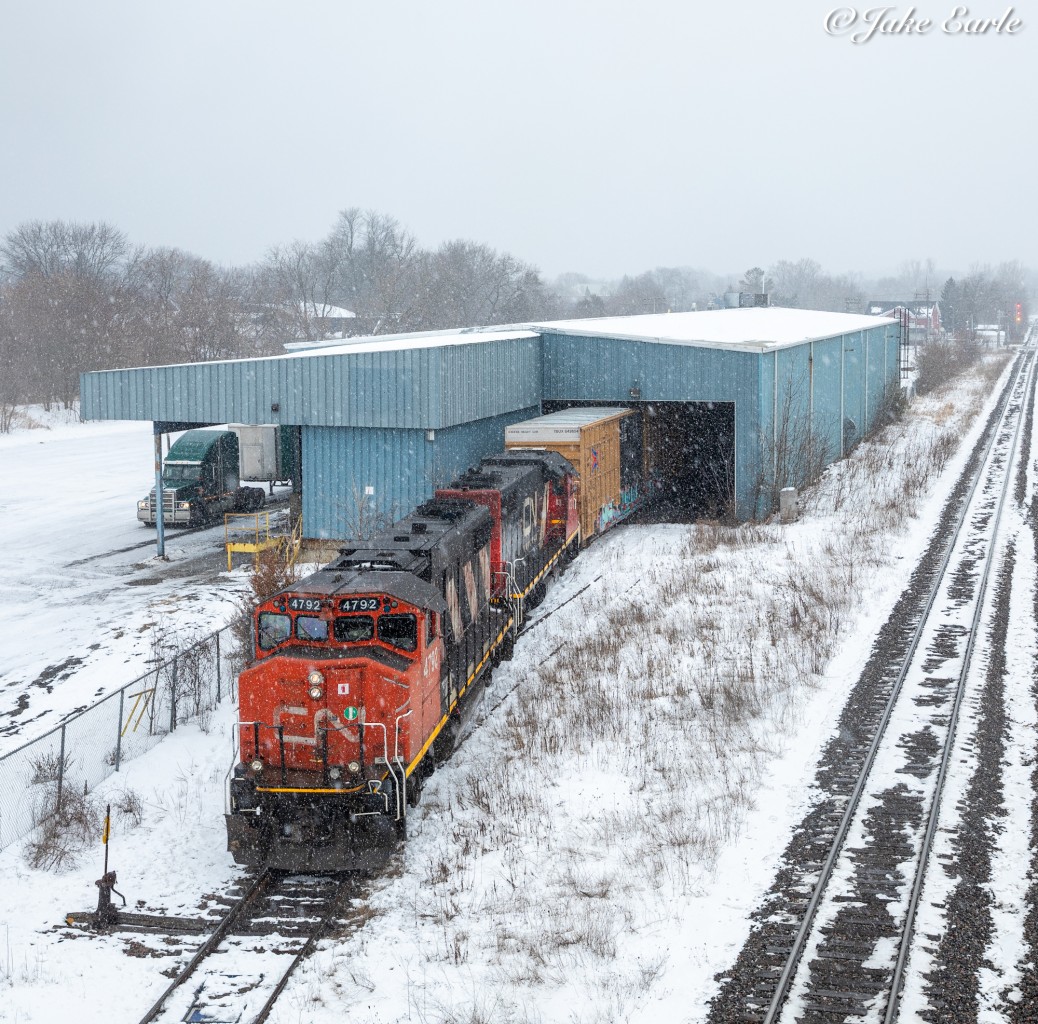 As the snow starts to fall, CN L532 is seen pulling two loaded boxcars filled with furniture pieces out of the old Clarke Building. A bit ago, they used to not see customers at that building often, but lately they’ve been getting boxcars with furniture pieces (from what a contact told me) a lot lately. Still an awesome move to see either way. The best thing is is that you can see the move happen from the Stewart Blvd overpass in town.