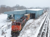 As the snow starts to fall, CN L532 is seen pulling two loaded boxcars filled with furniture pieces out of the old Clarke Building. A bit ago, they used to not see customers at that building often, but lately they’ve been getting boxcars with furniture pieces (from what a contact told me) a lot lately. Still an awesome move to see either way. The best thing is is that you can see the move happen from the Stewart Blvd overpass in town.
