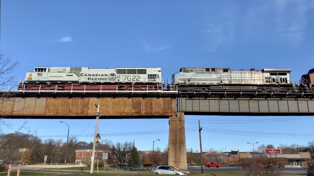 CP 7022, CEFX 1002 and another CP unit lead 113 past Port Hope