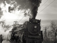 One of the last excursions to be pulled by CN's Northern 6218 heads north past St Clair Avenue station on its way to Stratford and London. It was finally retired in July 1971.