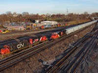 CN G875 arrives at Stuart Street Yard in Hamilton with CN 3236 and 18 fresh hoppers from National Steel Car.  This train originated out of Fort Erie this afternoon and would lift more cars from Hamilton.  Thanks to Jamie Knott for the heads up on this move.