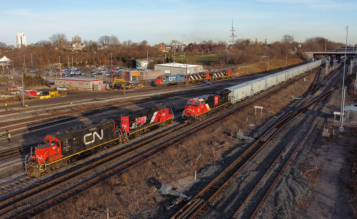 CN G875 arrives at Stuart Street Yard in Hamilton with CN 3236 and 18 fresh hoppers from National Steel Car.  This train originated out of Fort Erie this afternoon and would lift more cars from Hamilton.  Thanks to Jamie Knott for the heads up on this move.