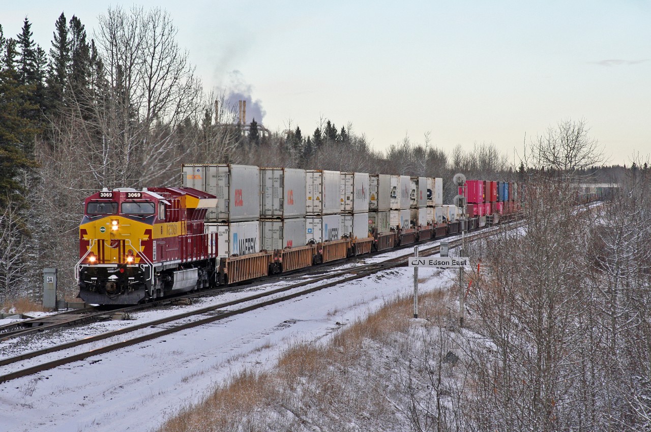 CN 3069 leads train Q 11791 21 into Edson for a crew change.  As luck would have it, the sun would come out shortly after this picture - however CN 117 would be held back for a fleet of 5 eastbounds and then delayed behind 301 which stalled at Big Eddy due to a power failure.  117 would get rolling again shortly after sunset.