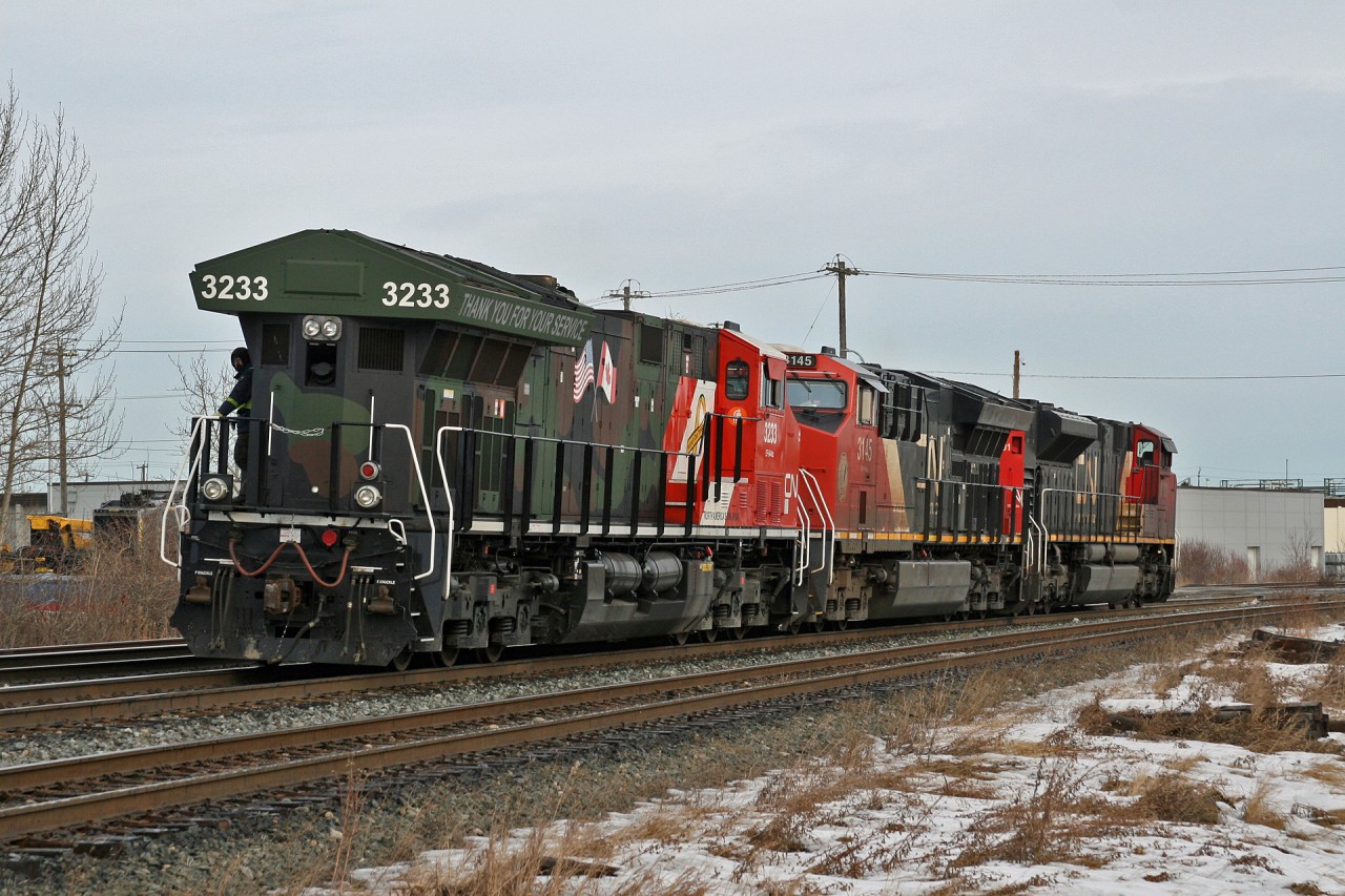 G 84751 06 shoves over to Bissell Yard with CN 3233, the Veterans unit on the point.  Once at Bissell, CN 3233 will become the midtrain DP unit with CN 3145 and CN 8101 on the headend for the trip to the coast.