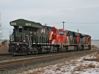G 84751 06 shoves over to Bissell Yard with CN 3233, the Veterans unit on the point.  Once at Bissell, CN 3233 will become the midtrain DP unit with CN 3145 and CN 8101 on the headend for the trip to the coast.