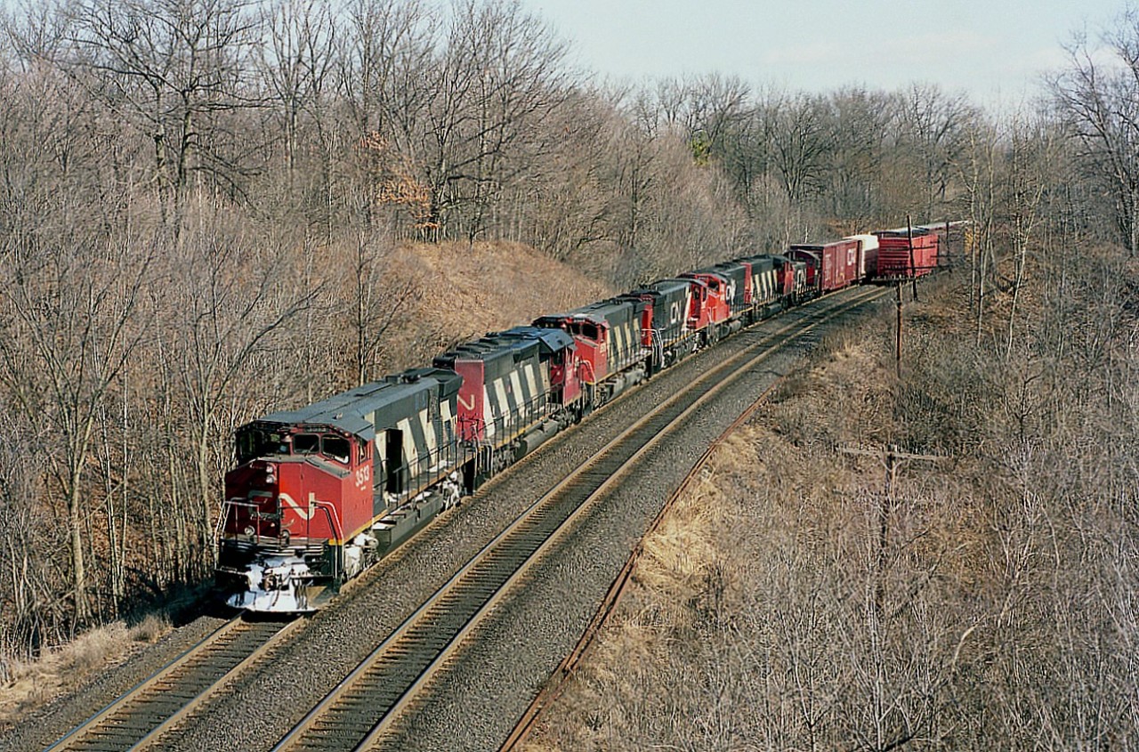 Nice collection of power as seen from the Plains Road bridge out in Aldershot. Train #433 is a Toronto to Windsor run, and today the head end features three MLW M-420s within the consist of  CN 3513, 5117, 3509, 3502, 9433 and 7311. The 420s were already beginning to be retired and dealt off by this time.