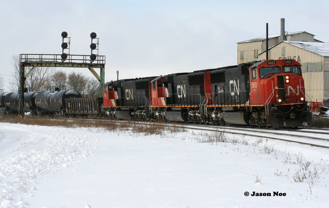 The previous day's CN 434 is slowly making progress as it completes it's lift at Paris, Ontario on the Dundas Subdivision with a trio of SD75I's that included; 5655, 5743 and 5693.