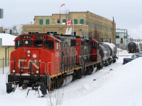 After a long night traversing the Waterloo Spur, CN L566 is seen timed-out in Elmira with 4784 and 7025 with the Lanxess Canada facility providing the backdrop. Previously the facility was Crompton Chemicals and Uniroyal Chemicals prior to its current name and is a regular switch for the CN job based out of Kitchener. This would be the first time I photographed L566 on the Waterloo Spur in 2020 with thankfully many more opportunities to come. 
<br>
Here's to a hopefully much better as well as healthy and prosperous 2021 to all.
