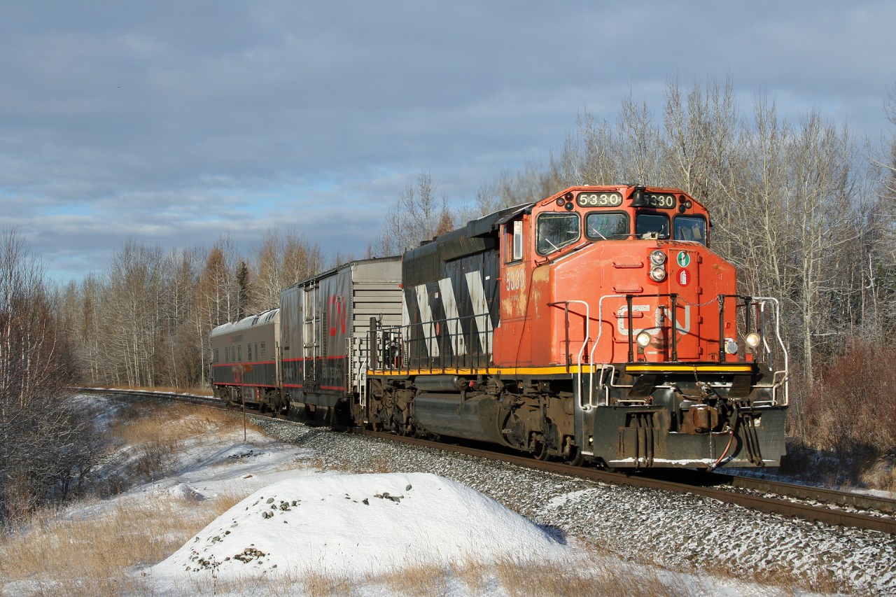 CN O 99851 25 TEST Train rolls through Wildwood on the Edson Sub