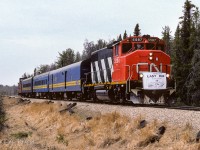 I was well prepared for this day, just wish there could have been brighter illumination. This will be the "Last Run" of No. 91 from Edmonton to Waterways. I thought it was a nice touch by CN to have the 5587 as leader. Following behind is Baggage 7856, Coach's 5099 & 5095, Cab 79881 at the rear. It was a great little train while it lasted, I feel very fortunate to have had it pass through our town. Photo taken a few miles west of Redwater, just after lunch. 