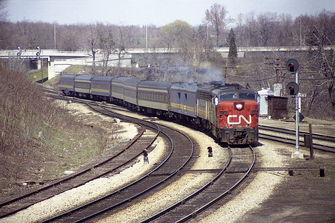 Nice spring day at Bayview Junction watching trains......CN 6790 westbound about to start up the hill to London, with unidentified B unit in VIA paint trailing.  Note the old helper track from steam days is still intact on the left.
