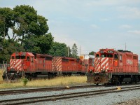 CP GP7u 1505 (Built in 1953 as CP 8424) sitting by its lonesome in the yard at Galt. To the left, T69 departs back to London with CP 5719 - CP 5937
