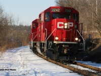 CP T99-23 passes Mile 4 on the Waterloo Subdivision in Preston, Ontario with 2242, 2281 and 4007. The job was returning with a short train from  the yard at Hagey in Cambridge to Wolverton yard on the Galt Subdivision. February 23, 2020.