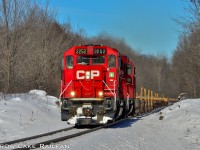 CP 9-119 breaks the silence as it passes by Anderson Rd just outside of Tichborne, Ontario with the Smiths Falls yard units leading a 76 empty car train.

Although I have never seen this happen in the past couple years I've been railfanning I heard its actually pretty common to have empty, stored cars returned to service after with the yard units after the manufacturing facilities change their tooling for the next models of cars. That's for the autoracks at the tail end of this train. As for the baretables up front I can only guess it's for a similar reason.

Despite it never being confirmed I believe the power returned trailing on 112 later that night/ early the next morning to power the next F55 servicing the Omya factory in Perth.