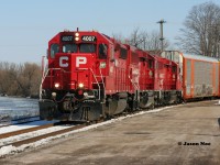 CP T72 slowly runs beside the Speed River in Preston, Ontario on the Waterloo Subdivision. The train has 18 cars for the yard at Hagey in Cambridge and is powered by CP 4007, 2281 and 2242. CP GP40-3 4007 started out life as Milwaukee Road 2066 before becoming SOO Line 2066. February 22, 2020.