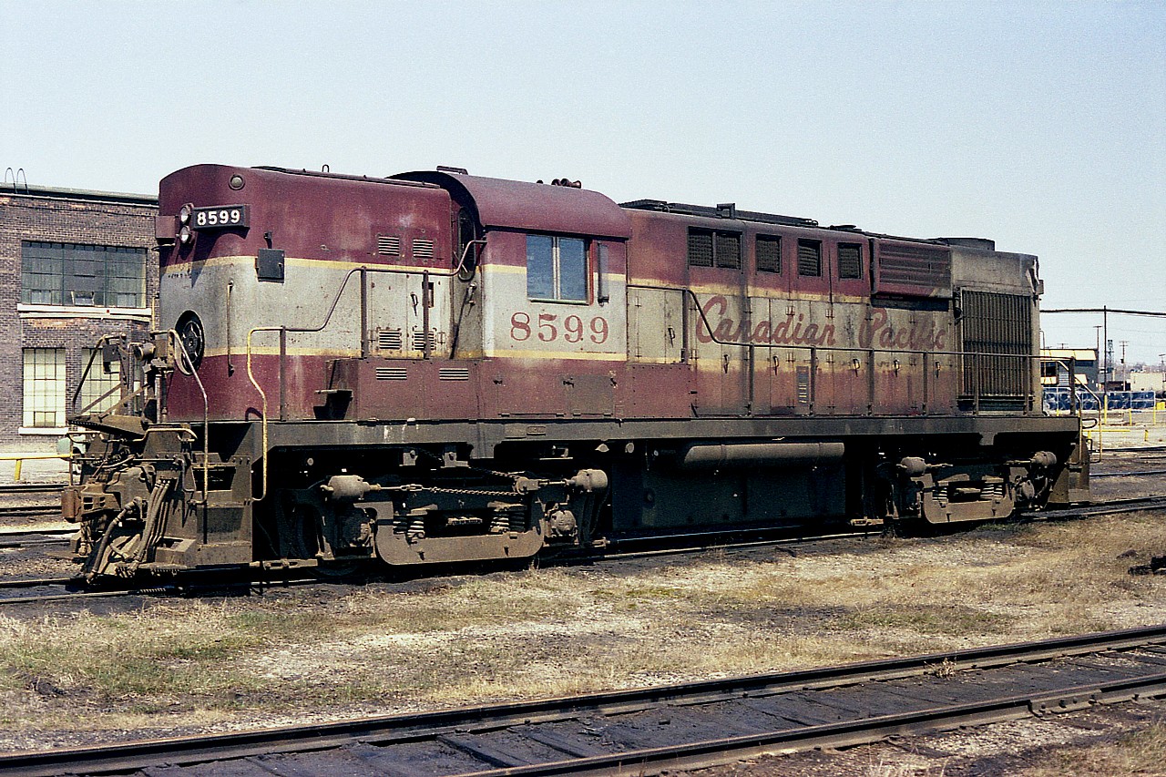 Wednesday the 23rd of April in 1975 I noted as my day off work and since it had all the indications of being a great day to head out, I drove from home (St. Catharines) down toward Bayview and at the suggestion of a friend (Bill McArthur) we drove over to the TH&B roundhouse area at Chatham St off Dundurn to kill a bit of time as it was quiet at the junction. Besides a few TH&B units, this old CP RS10s #8599 was looking pretty good, as by this time there were not all that many units left in the old script paint scheme. The 8599 was retired, along with most of the others in this group by 1984 and I have wondered if this unit survived long enough to get repainted into the "action' red.  I always liked this image.