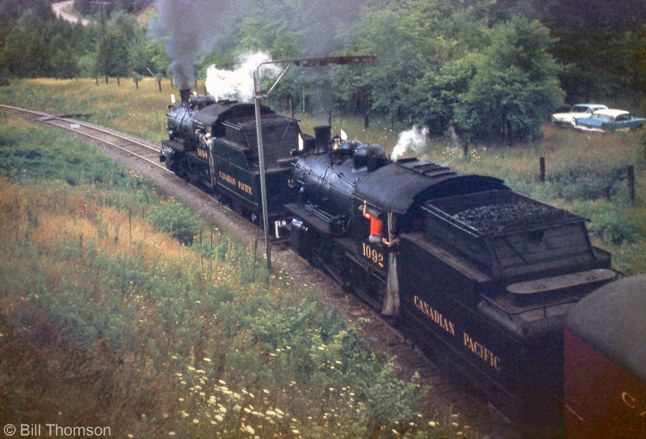 Another photo of the NRHS Buffalo Chapter fantrip over CP in July 1959: CPR D10's 1098 and 1092 head under the bridge at Cataract, travelling up the Orangeville Sub enroute to Orangeville (approach photo <a href=http://www.railpictures.ca/?attachment_id=28108?here).