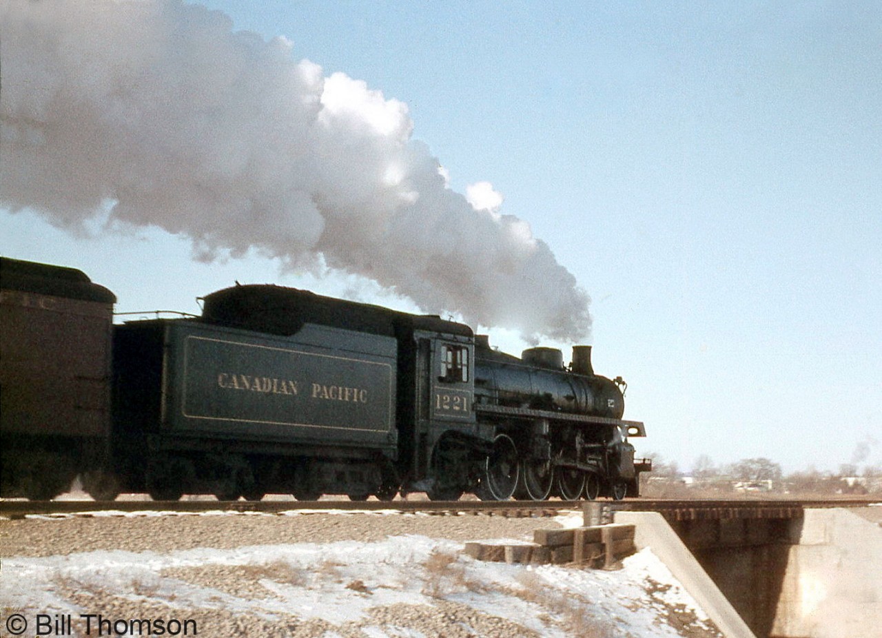 CPR G5b 1221 (built by MLW in October 1945, scrapped February 1960) heads eastbound over CN's Oakville Sub, crossing over Cooksville Creek (at Mile 11.8) east of Port Credit near "CN Lakeview".