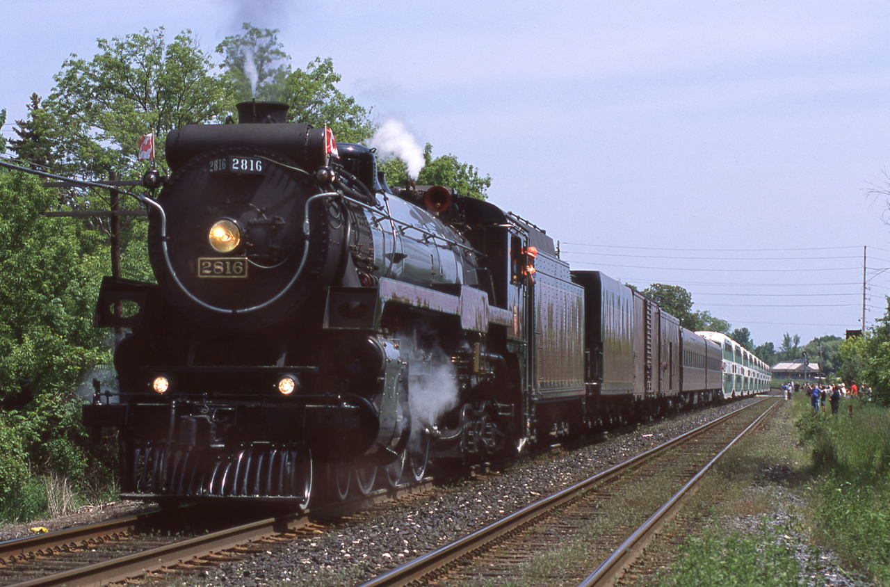 For upload #500 I figured I'd dust off a classic. The summer of 2003 saw multiple 2816 runs in southern Ontario. One such movement is seen here about to cross Tannery Street in Streetsville with a Guelph Junction bound public excursion, good times.