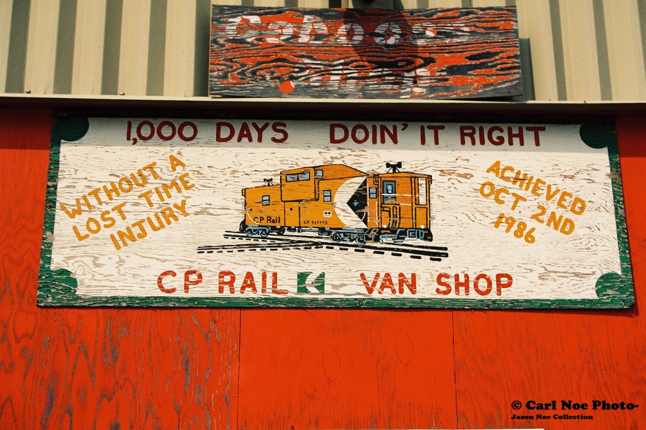 The wooden sign that was hanging above the caboose shop building in CP's Toronto yard is seen during a fall afternoon while several cabooses were still lined-up outside.