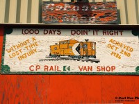 The wooden sign that was hanging above the caboose shop building in CP's Toronto yard is seen during a fall afternoon while several cabooses were still lined-up outside. 