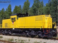 An oddball on the Canadian locomotive scene is this ALCO C415, one of only 26 built between 1966-1968.  These unique locomotives were designed as a "combination road and yard switcher," with three cab options; low, medium (pictured), and high (for road use), depending on the operator's needs.  The 4010 is seen at the Aquitaine Ram River Gas Plant, and was one of two C415s two work there, the other being Aquitaine 4011.  Unlike most C415s which used the standard AAR trucks, these units, both of Spokane, Portland & Seattle Railroad heritage, were constructed with ALCO's high adhesion trucks.<br><br>As SP&S's only C415s, both 4010 and 4011 spent much of their careers working alongside one another.  4010 was originally built <a href=https://www.railpictures.net/photo/745474/>as their #100,</a> later becoming <a href=https://www.railpictures.net/photo/262726/>Burlington Northern 4010</a> in 1970.  Aquitaine 4011 began as SP&S 101, to BN 4011, and Aquitaine 4011.  Following retirement by BN in mid-1980 and the 1981 sale to Aquitaine, the units would arrive at the Ram River facility not long before this image was taken.  By 1982, the units were <a href=http://www.trainweb.org/oldtimetrains/industrial/ab/Canterra_4010.jpg>restenciled for the facility's new owner,</a> Canterra Energy, operating with them until the company's 1989 purchase by Husky.  As of January 1, 2021 Husky is now owned by Cenovus.  Husky Energy would retire both locomotives in 1996 and they would return to the states operating for Ohio River Terminals in Huntington, West Virginia.  Little information can be found past this point, but it seems the units were worked hard with little maintenance, both retired in 2004 in need of new wheels and a new prime mover for 4010.  After being up for sale for a year, both units were scrapped onsite in July, 2005.<br><br>A 1997 video of 4010/4011 working Ohio River Terminals can be found <a href=https://www.youtube.com/watch?v=75chdSrWGwY>here.</a><br><br><i>James Claflin Photo, Jacob Patterson Collection slide.</i>