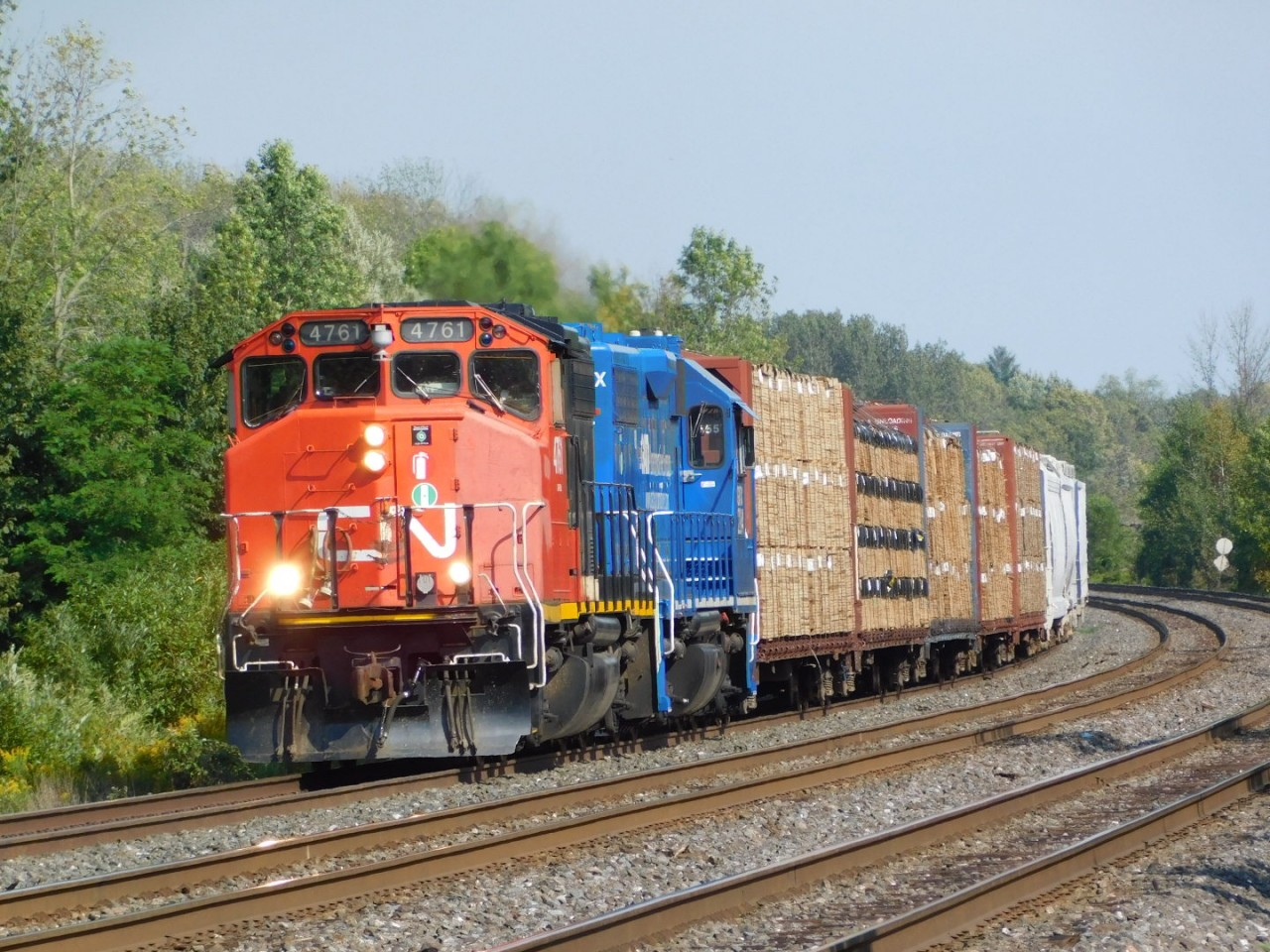 CN's Belleville - Port hope ( stops in Cobourg and Trenton ) L518 rounding the corner into Cobourg yard limits. I had to go see this train as it's normally a pair of GATX leasers, so when I found out a Canadian cab Geep was leading I went out right away.