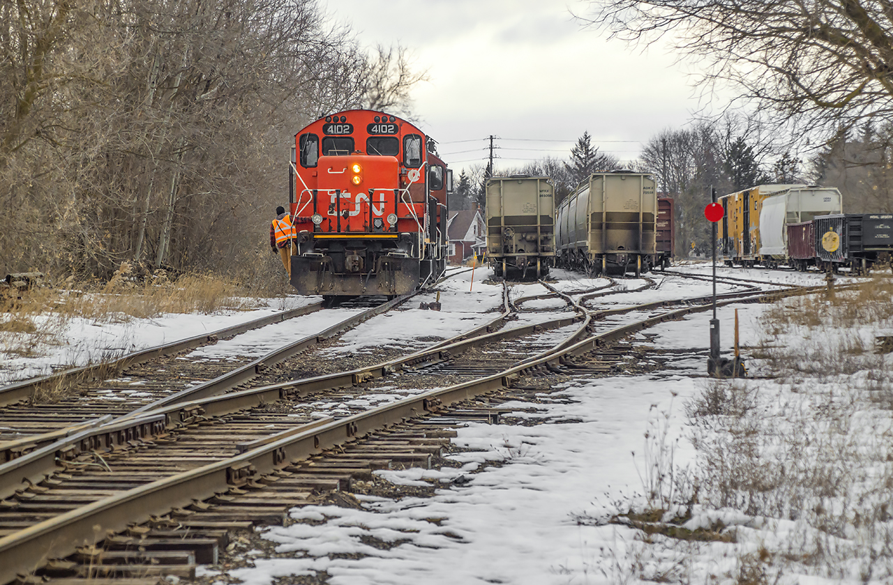 Off to Work, CN L568 rolls through XV Yard where it will lift cars for the north end.  At this time, GEXR 582, running as a Sunday extra, was just arriving to the interchange.