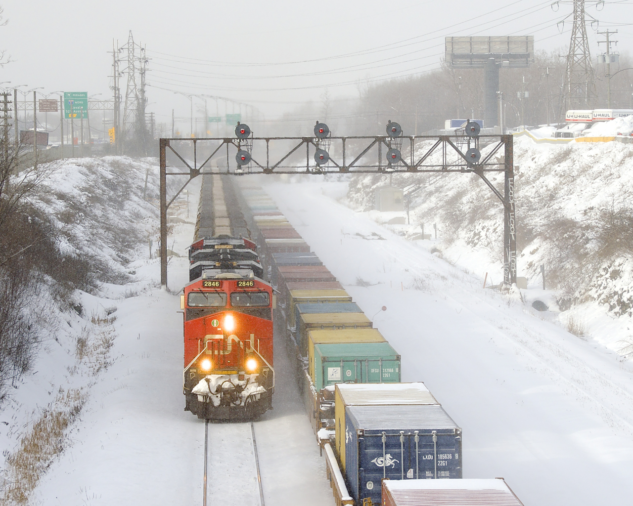 CN B730 is passing CN 149 on a bitterly cold morning.