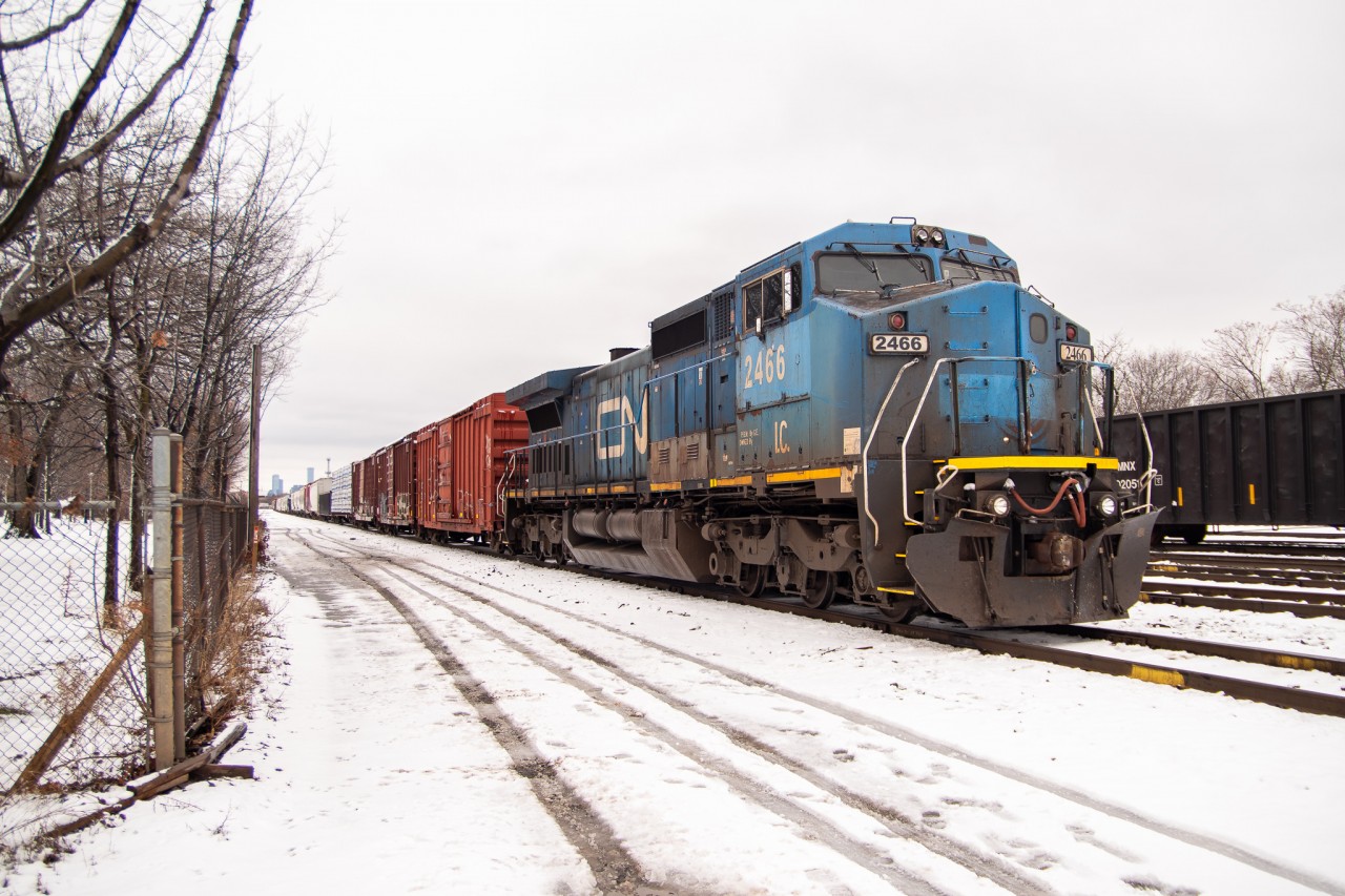 After coming down on a 420 the previous day and then being dropped here by CP 246-02, CN/IC C40-8W #2466 idles just east of the Lambton Yard Office coupled to a sizeable cut of cars which were also dropped off by 246. It was left here for pickup later on by L549 in the dead of night (which turned out to actually have CN 7600 on it according to a friend who saw it). A cool catch this was for sure!