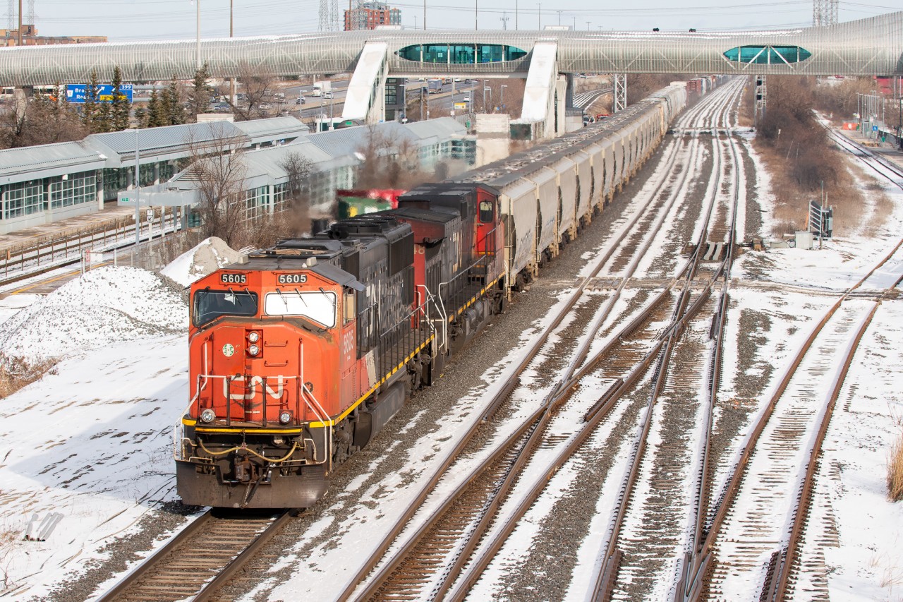 An abrupt trip to Pickering was made by myself today as word got out about a 149 with a pretty special leader; C40-8m #2420 on the head end. Turns out 149 would not be the only good train I’d see though, as about half an hour after it’s passage came L517 after finishing their work at Oshawa. CN 5605, one of a small handful of SD70i’s on the roster takes the lead as they enter the York Sub and begin to climb the hill, horn blaring for track workers as they pass.