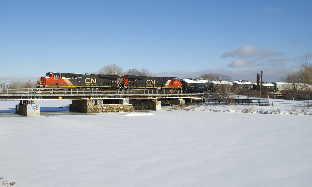 ES44AC's CN 2972 & CN 2944 lead CN 527 over the snow-covered Lachine Canal a few hours after a snowstorm ended.
