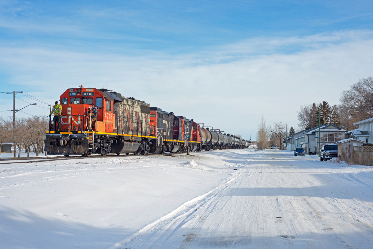 With interchange cars from the CP, a CN beltpack job heads back to CN's Regina Yard. At 47 years young, CN 4718 looks like a good paint shop candidate.